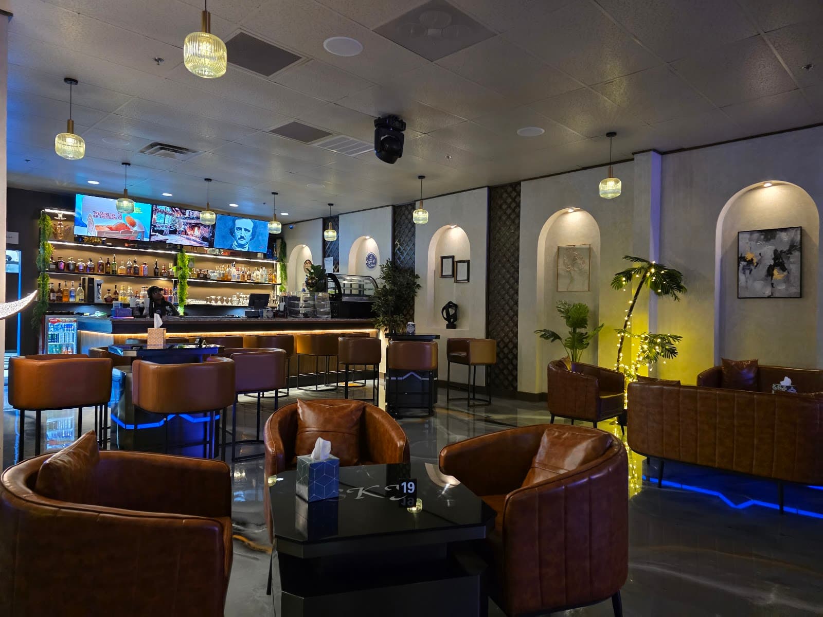 The Sky Cafe bar with backlit shelves and dessert case